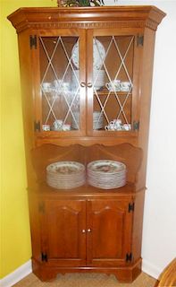 An American Corner Cabinet, Height 74 x width 39 x depth 20 inches.