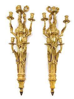 A Pair of Louis XVI Style Gilt Bronze Five-Light Sconces Height 38 1/2 inches.