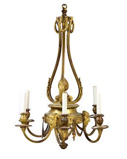 * A Neoclassical Gilt Metal Six-Light Chandelier Height 29 1/4 x diameter 20 1/2 inches.