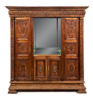 * A Flemish Carved Oak Cabinet Height 84 x width 78 x depth 22 inches.