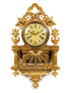 A Swedish Giltwood Cartel Clock Height 25 1/4 inches.