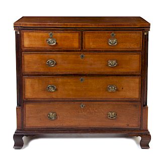A George III Oak and Mahogany Chest of Drawers Height 43 1/2 x width 45 1/8 x depth 17 3/4 inches.
