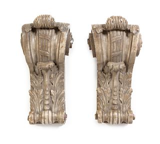 A Pair of Carved Marble Corbels Height 15 x width 8 inches.