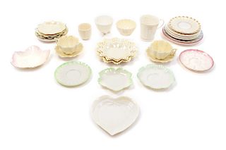 * A Collection of Belleek Tea Cups and Saucers Diameter of largest saucer 7 3/8 inches.
