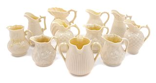 * Eleven Belleek Creamers Height of tallest 4 1/8 inches.