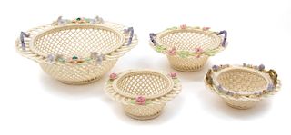 * Four Belleek Three Strand Baskets Diameter of largest 8 1/2 inches.