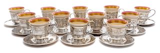 A Set of Twelve American Silver-Lined Porcelain Coffee Cups, Barbour Silver Co., Hartford, CT, each Lenox porcelain bowl with a