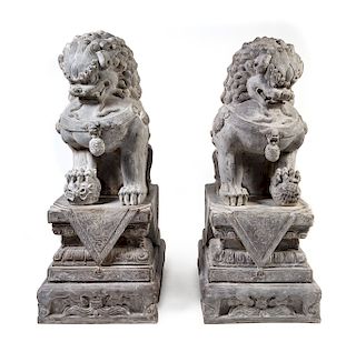 * A Pair of Large Composition Temple Guardians Height overall 66 inches.