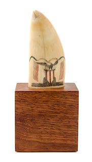 * An American Engraved and Colored Scrimshaw Whale Tooth Height 4 1/4 inches