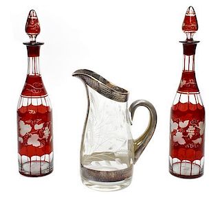 A Pair of Bohemian Cut Glass Decanters, Height of first 14 1/2 inches.
