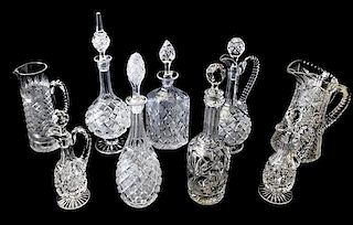 A Collection of Cut Glass Vessels, Height of tallest 10 1/2 inches.