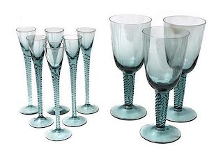 A Partial Set of Blown Green Glass Stemware, Height of taller 9 3/4 inches.