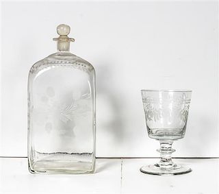 An Engraved Blown Glass Decanter, Height of tallest 11 3/4 inches.
