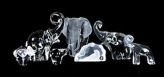 A Collection of Seven Glass Figures of Elephants, Height of tallest 5 1/4 inches.