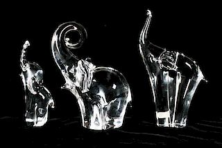A Collection of Three Italian Glass Figures of Elephants, Height of tallest 11 inches.