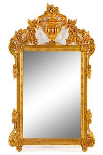 A Louis XVI Style Giltwood Mirror Height overall 50 inches.