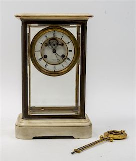 A French Brass and Marble Crystal Regulator Clock Height 16 1/2 inches.