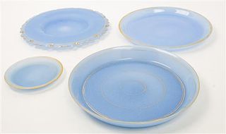 Four Opaline Glass Plates Diameter of largest 12 1/2 inches.