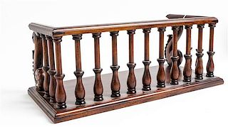 A Mahogany Gallery Height 6 3/8 x width 16 5/8 x depth 7 5/8 inches.