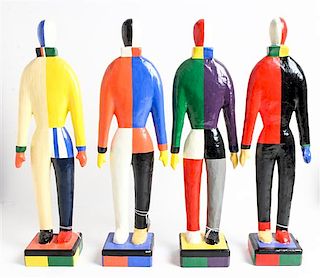 A Set of Four Polychrome Resin Figures Height of each 19 inches.
