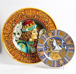 A Collection of Four Polychrome Majolica Chargers Diameter of largest 22 inches.