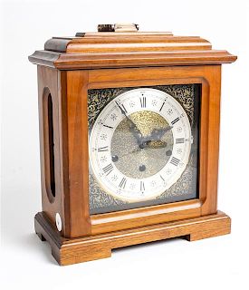 A German Mahogany Cased Mantel Clock Height 14 inches.
