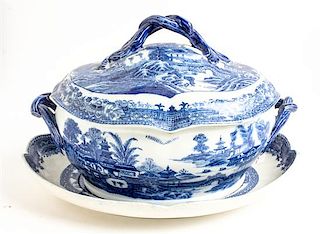 An English Blue and White Porcelain Soup Tureen and Undertray Length of undertray 13 inches.