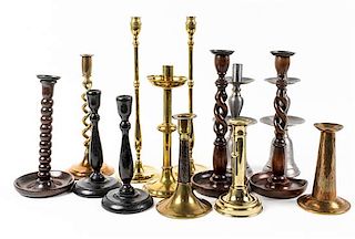 * A Collection of Brass and Oak Candlesticks Height of first 8 inches.