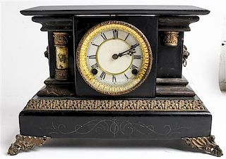 An American Gilt-Metal Mounted and Ebonized Mantel Clock Height 13 x width 18 inches.
