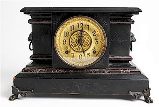 An American Ebonized Mantel Clock Height 10 x width 16 inches.