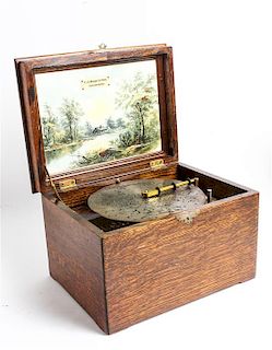 An American Cased Music Box Height 8 x width 12 1/4 inches.
