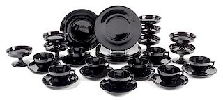A Large Group of Black Glass Cups and Saucers, 34 total