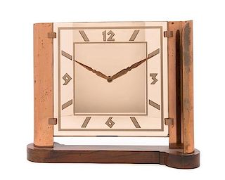 Art Deco, 1930s, a peach glass and copper clock, on a wood base
