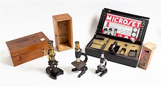 A Group of Two Cased Microscopes Height of tallest 7 1/2 inches.