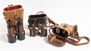 A Collection of Cased Field Binoculars Length of longest 12 1/2 inches.