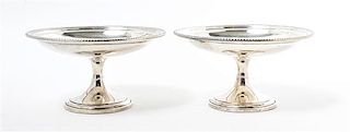 A Pair of American Silver Compotes, Gorham Mfg. Co., Providence, RI, the bowls with a gadroon rim, centered by an engraved scrip