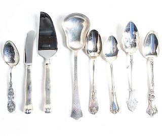 A Collection of Silver Flatware Articles, various makers, comprising teaspoons, sugar tongs, souvenir spoons and others, togethe