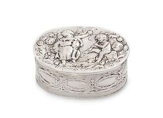 A German Silver Box, 19th/20th Century, of oval form, worked to show figures in relief.