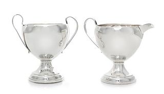 An American Silver Creamer and Sugar, Preisner Silver Co., Wallingford, CT, 20th Century, each of handled form, weighted.