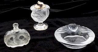 A Lalique Smoking Set Diameter of largest 6 inches.