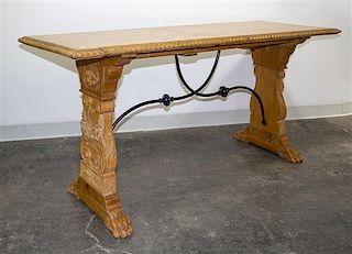* A Spanish Baroque Style Iron Mounted Table Height 29 1/2 x width 66 x depth 25 inches.