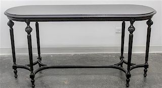* A Louis XVI Style Ebonized Table Height 30 1/2 x width 59 x depth 20 inches.