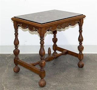 A Jacobean Revival Side Table Height 21 1/2 x width 24 x depth 17 3/4 inches.