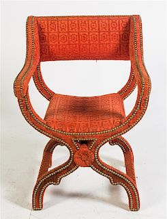 * A Nailhead Decorated Upholstered Savonarola Armchair Height 34 3/4 inches.