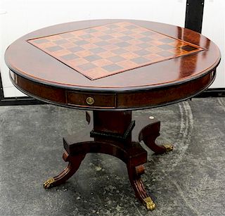 A Georgian Style Mahogany Flip-Top Games Table Height 29 1/2 x width 41 inches.