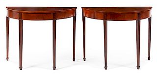 A Pair of Georgian Style Mahogany Console Tables Height 33 x width 43 1/2 x depth 19 inches.