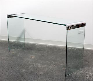 A Chrome and Glass Cocktail Table Length of top 57 inches overall.