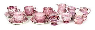 A Victorian Pink Spatterware Partial Tea Service, Height of creamer 3 1/4 inches.