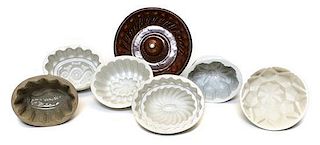 A Collection of Seven Ceramic Molds, Width of widest 12 inches.