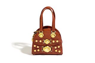 A Gianni Versace Brown Leather Mini Medusa Handbag, 7" x 6.5" x 2.5".